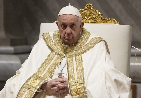 Pope Francis presides over the First Vespers and Te Deum, the rite of thanksgiving for the end of the year, in Saint Peter&#039;s Basilica at the Vatican, Sunday, Dec. 31, 2023. (AP Photo/Andrew Medic ...