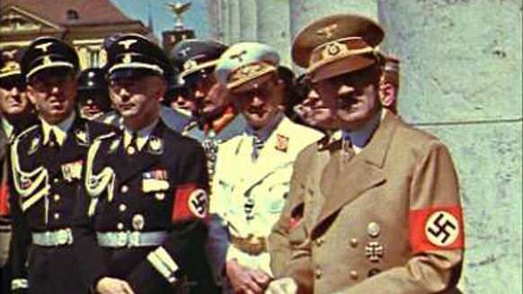 This scene of Adolf Hitler and Nazi officials in Munich in the summer of 1939 -- just before the start of World War II, supplied by C.Cay Wesnigk Film, is from &quot;Hitler&#039;s Hit Parade,&quot; a  ...