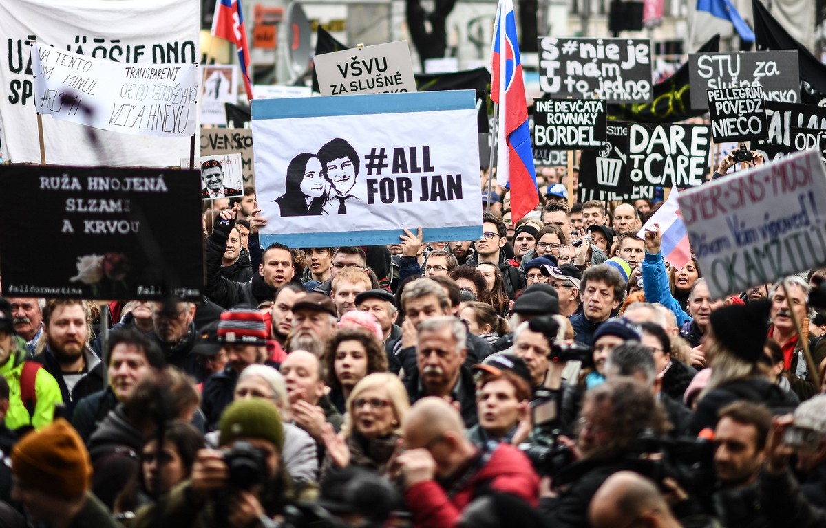 epa06608464 A placard with hashtag #allforJan is seen as people participate in a rally called 'Let's stand for decency in Slovakia' in Bratislava, Slovakia, 16 March 2018. Mass street p ...
