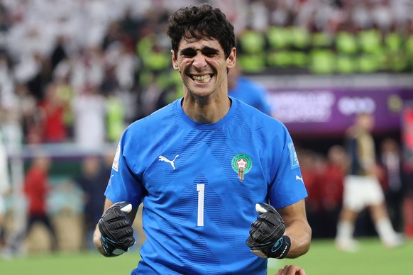 epa10359644 Goalkeeper Yassine Bounou of Morocco reacts after the FIFA World Cup 2022 quarter final soccer match between Morocco and Portugal at Al Thumama Stadium in Doha, Qatar, 10 December 2022. EP ...