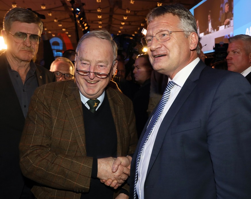 epa06364099 Joerg Meuthen (R), the new elected Federal chairman of the German right-wing &#039;Alternative for Germany&#039; party (&#039;Alternative fuer Deutschland&#039; AfD) shakes hands with Alex ...