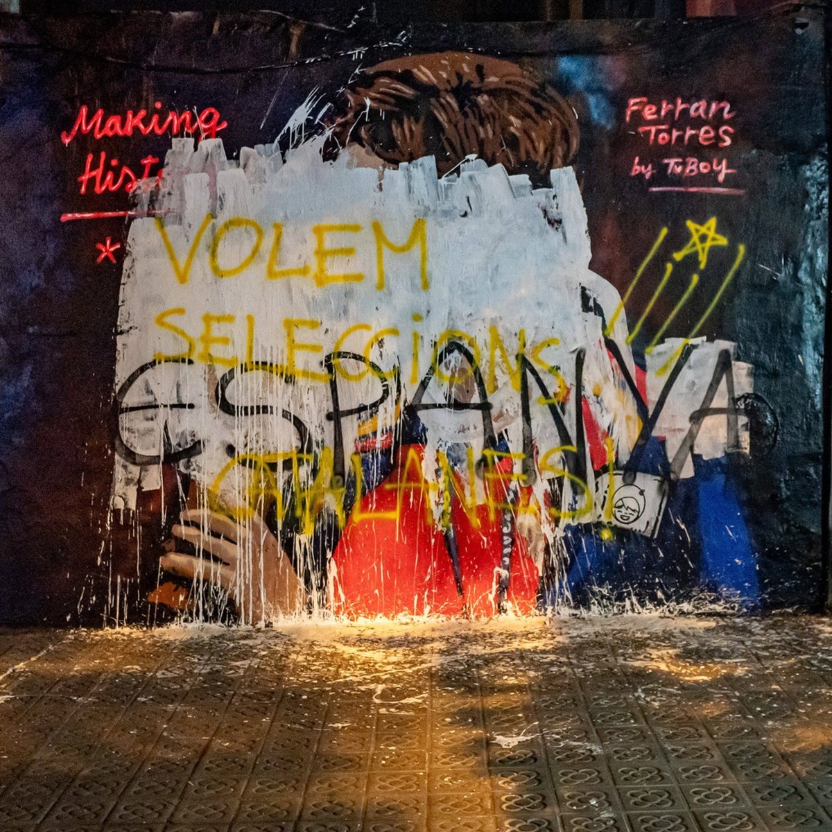 July 22, 2026, Barcelona, Spain: The mural by street artist TVBoy depicting Spain s Ferran Torres kissing the FIFA World Cup trophy is seen vandalized with white paint and graffiti in Barcelona, a day ...