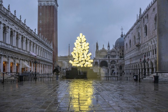 The digital Christmas tree by artist Fabrizio Plessi is set in St.Mark&#039;s Square in Venice, Italy, Friday, Dec. 4, 2020. (Filippo Ciappi/LaPresse via AP)