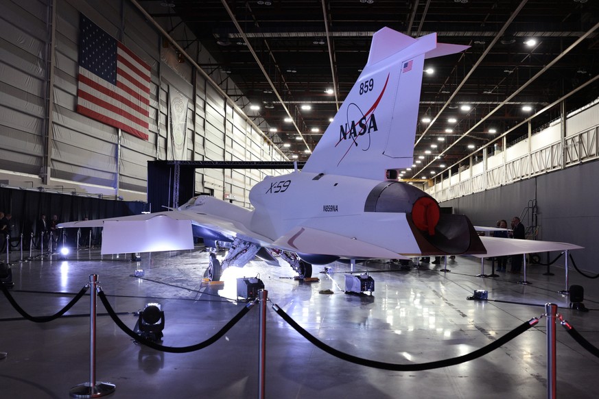 epa11072609 The supersonic X-59 aircraft, produced by NASA and Lockheed Martin Skunk Works, is unveiled at Lockheed Martin Skunk Works in Palmdale, California, USA, January 12, 2024. The X-59 is the cent...