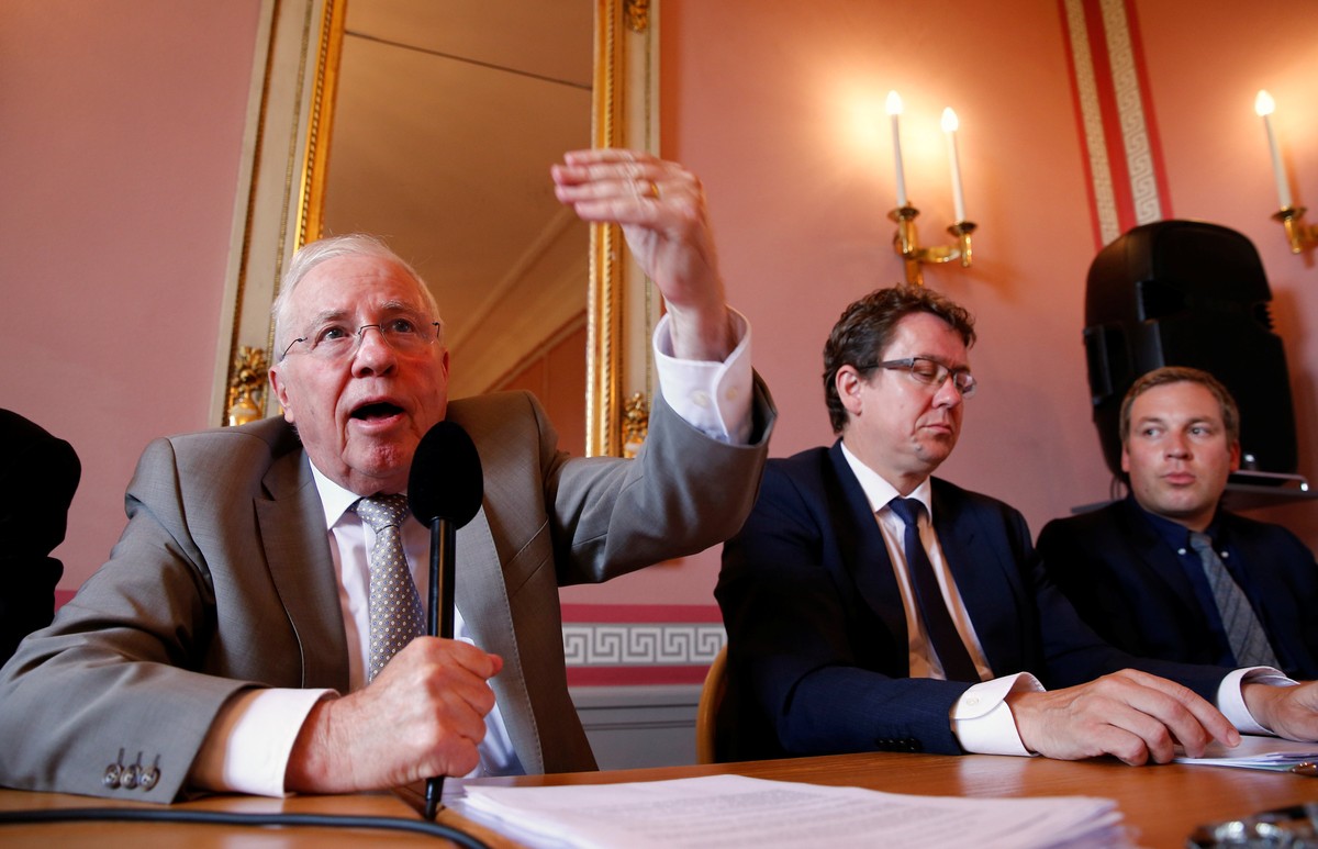 Christoph Blocher, president of the "No to slow EU accession" committee (L), gestures next to Albert Roesti (C) president of the Swiss People's Party (SVP) and Lukas Reimann, president  ...