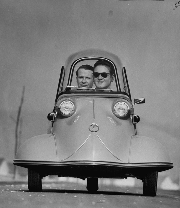 Front shot of two men riding in the three wheeled German made Messerschmidt. (Photo by Ralph Crane/The LIFE Picture Collection via Getty Images)