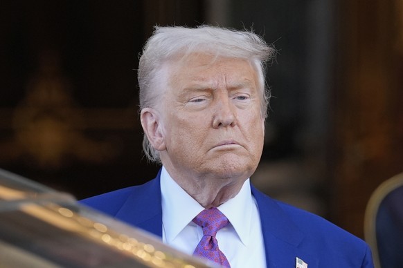 President Donald Trump looks on as he leaves the Royal Palace after a signing ceremony with Saudi Crown Prince Mohammed bin Salman in Riyadh, Saudi Arabia, Tuesday, May 13, 2025. (AP Photo/Alex Brando ...