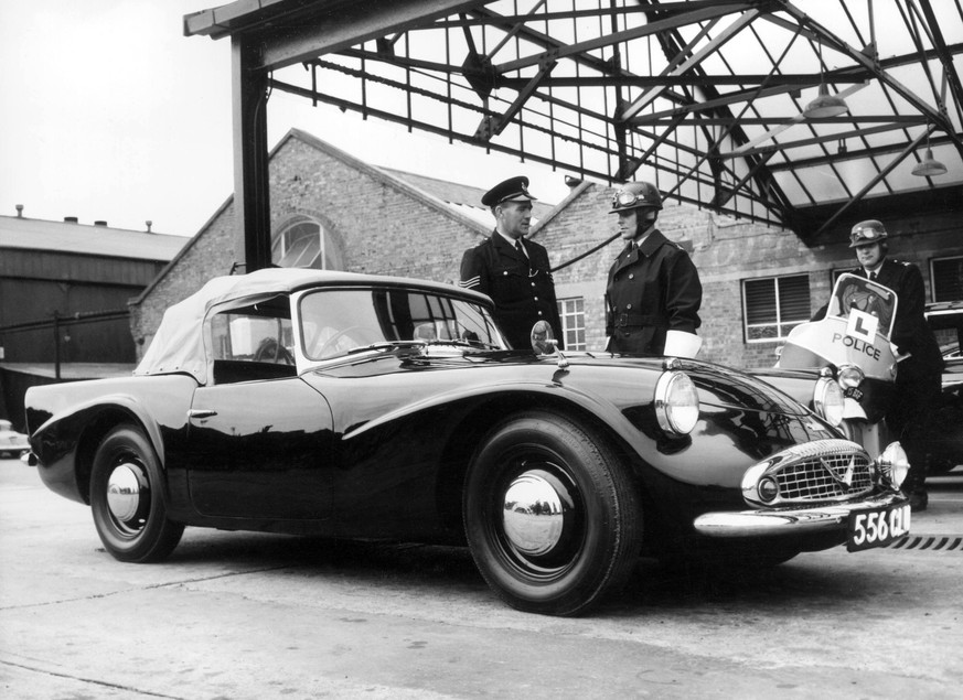 Orig. caption... 130 M.P.H. SPORTS CARS FOR SCOTLAND YARD 16-8-61 One of four Daimler SP 250 Sports cars which have recently been added to the traffic patrol in the Metropolitan Police Area, seen at t ...