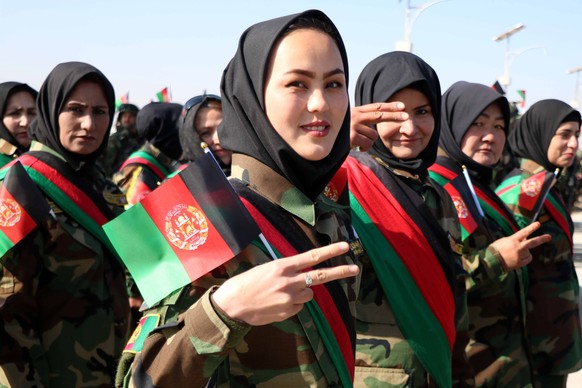epa09039741 Afghan army soldiers Celebrate Soldiers Day in Herat, Afghanistan, 27 February 2021. Afghan army soldiers mark the Soldiers Day on 27 February across Afghanistan to pay tribute to Afghan d ...