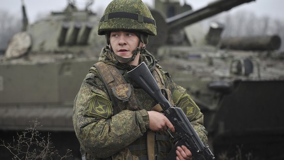 A Russian army soldier takes part in drills at the Kadamovskiy firing range in the Rostov region in southern Russia, Friday, Dec. 10, 2021. Russian troop concentration near Ukraine has raised Ukrainia ...