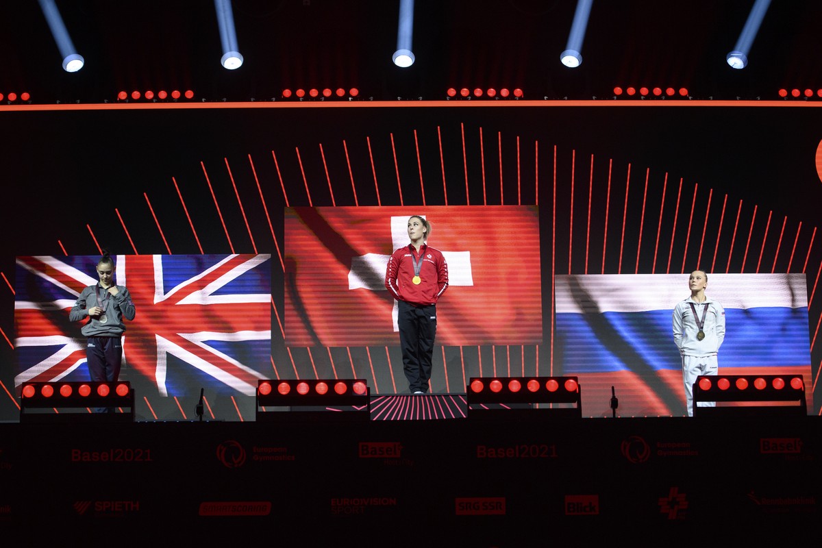 From left, Silver medalist United Kingdom's Jessica Gadirova, Gold medalist Switzerland's Giulia Steingruber and Bronze medalist Russia's Angelina Melnikova celebrate on the podium afte ...