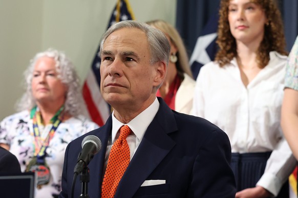 epa10693828 Texas Governor Greg Abbott answers questions after he signed the Save Women&#039;s Sports Act that would protect women in women?s sports, at the Texas Capitol in Austin Texas, USA, 15 June ...