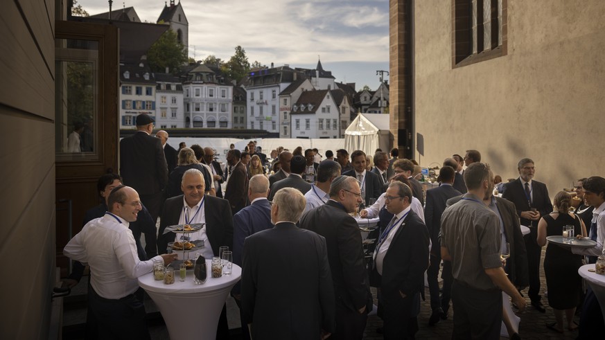 Guests chat during the reception of the 125th anniversary of the first Zionist congress in Basel, Switzerland on Monday, August 29, 2022. (KEYSTONE/Michael Buholzer)