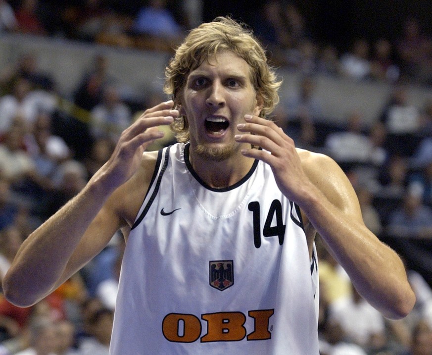 Germany&#039;s Dirk Nowitzki reacts to a call late in an 86-80 loss to Argentina in the semifinals in the World Basketball Championships in Indianapolis, Saturday, Sept. 7, 2002. (AP Photo/Darron Cumm ...