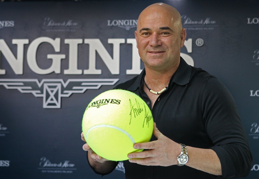 epa05895821 American tennis player Andre Agassi, winner of eight Grand Slam tournaments, participates in a press conference where he said that after retiring he can tour the cities where he travels, s ...