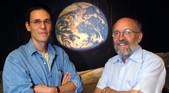 FILE - Swiss Astronomers Michel Mayor, right, and Didier Queloz, left, pose for the photographer at the Astronomical Observatory of the University of Geneva on Thursday, August 11, 2005 in Versoix. Te ...