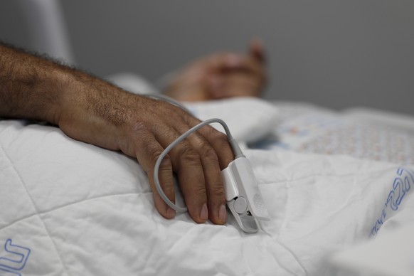 epa09411219 A patient receives treatment at the I.C.U coronavirus Covid-19 department at Ziv Hospital, in the northern city of Zefat, Israel, 12 August 2021. Israel launched a campaign to offer a thir ...