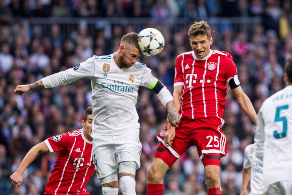 epa06705299 Real Madrid&#039;s defender Sergio Ramos (L) and Bayern Munich&#039;s forward Thomas Mueller (R) during the UEFA Champions League semi finals second leg match between Real Madrid and Bayer ...