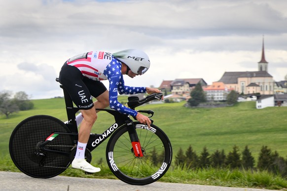 epa11302946 Brandon McNulty from the United States of UAE Team Emirates in action during the third stage, a 15.51 km individual time trial with start and finish in Oron, of the 77th Tour de Romandie U ...
