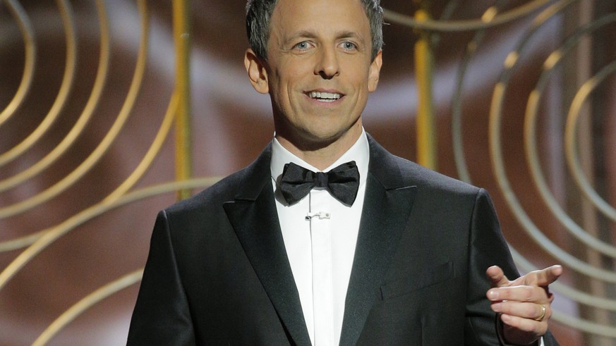 This image released by NBC shows host Seth Meyers at the 75th Annual Golden Globe Awards at the Beverly Hilton Hotel in Beverly Hills, Calif., on Jan. 7, 2018. (Paul Drinkwater/NBC via AP)