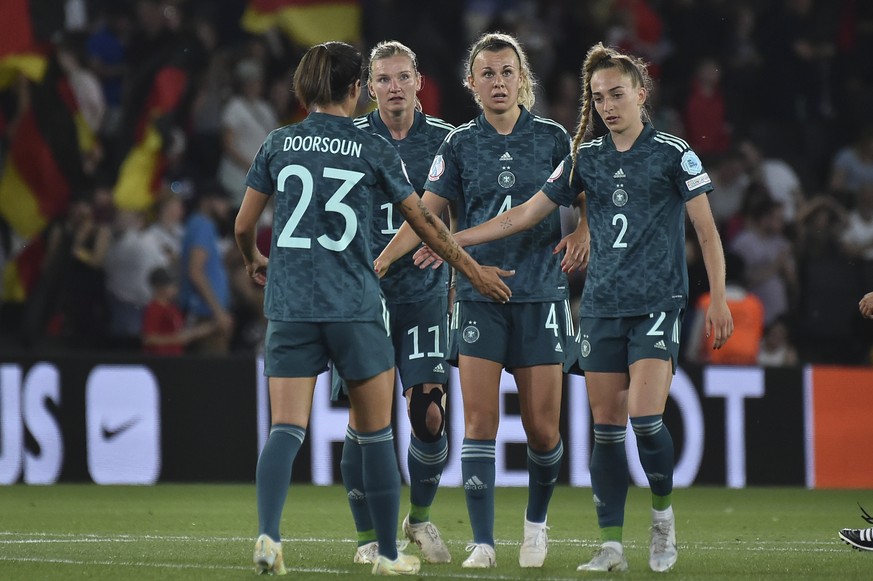 Germany players celebrate at the end of the Women Euro 2022 group B soccer match between Finland and Germany, at MK stadium in Milton Keynes, England, Saturday, July 16, 2022. (AP Photo/Rui Vieira)