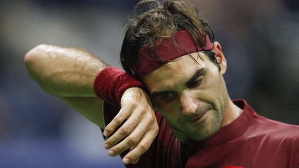 epa06995506 Roger Federer of Switzerland reacts during his match against John Millman of Australia during the eighth day of the US Open Tennis Championships at the Arthur Ashe Stadium in the USTA Nati ...