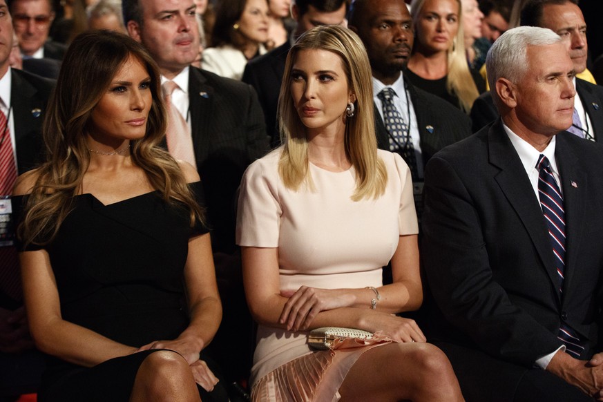 Melania Trump, left, Ivanka Trump, center, and vice presidential candidate Indiana Gov. Mike Pence wait for the beginning of the first presidential debate between Republican presidential candidate Don ...