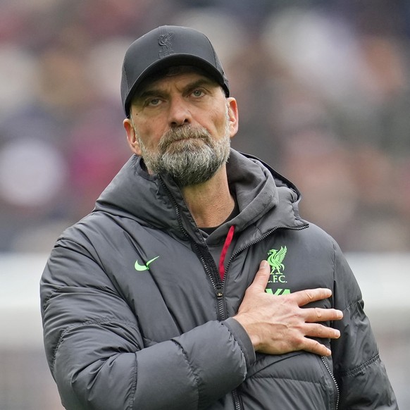 FILE - Liverpool&#039;s manager Jurgen Klopp gestures to fans at the end of the English Premier League soccer match between West Ham United and Liverpool at London stadium in London, Saturday, April 2 ...