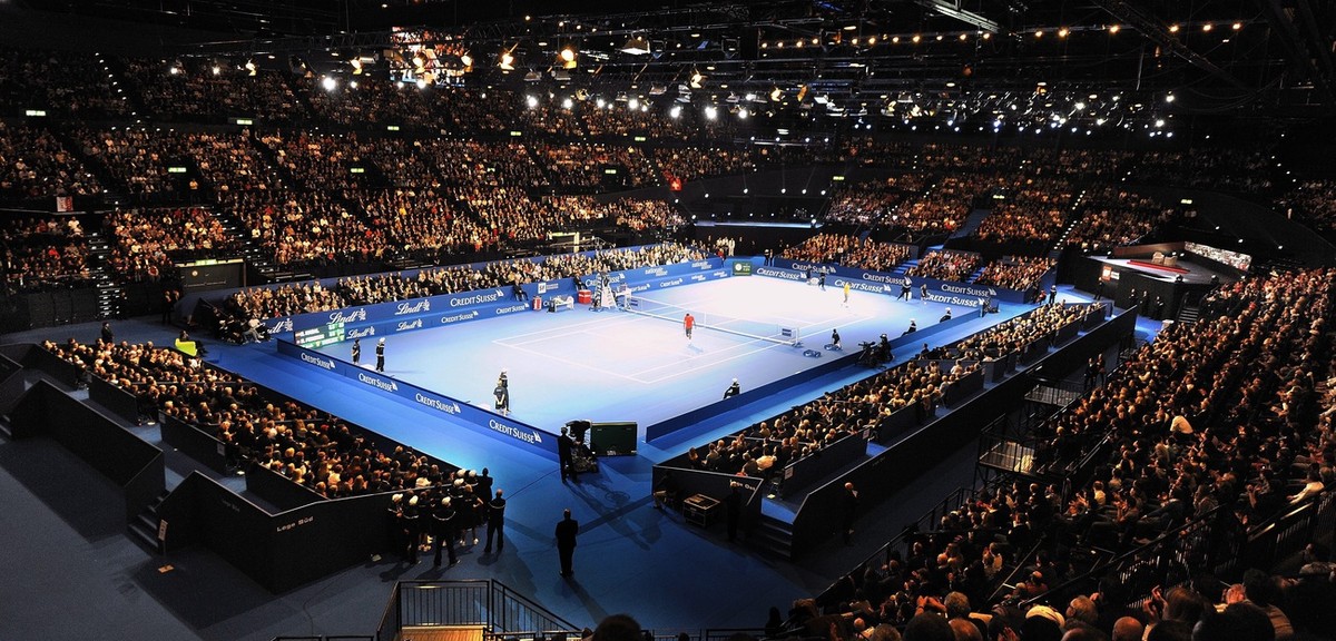Switzerland's Roger Federer, left, plays against Spain's Rafael Nadal, right, during the first exhibition match "Federer/Nadal Match for Africa" in the Hallenstation Arena in Zuric ...