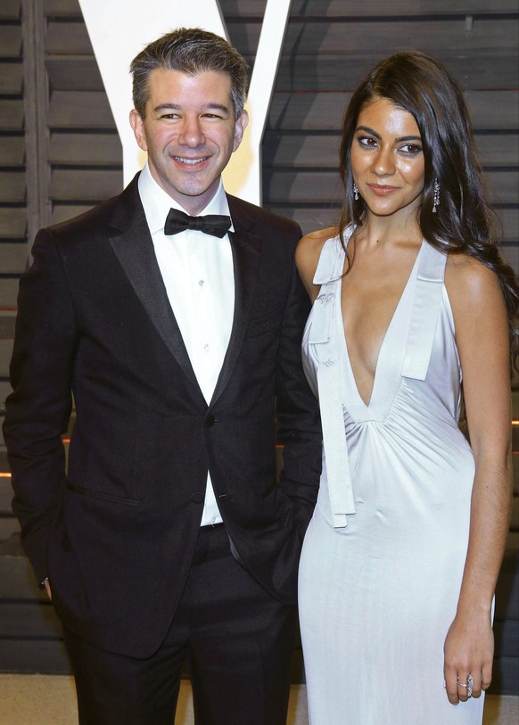 epa05818833 Travis Kalanick and guest arriving for the 2017 Vanity Fair Oscar Party following the 89th annual Academy Awards ceremony in Beverly Hills, California, USA, 26 February 2017. The Oscars ar ...