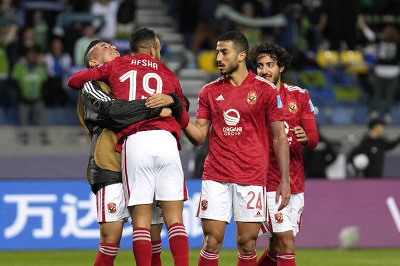 Al Ahly players celebrate after Al Ahly's Mohamed Afsha scored his side's opening goal during the FIFA Club World Cup soccer match between Seattle Sounders FC and Al Ahly FC in Tangier, Morocco, Satur ...