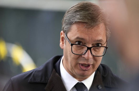Serbian President Aleksandar Vucic speaks with the media as he departs from an EU summit at the Brdo Congress Center in Kranj, Slovenia, Wednesday, Oct. 6, 2021. European Union leaders gathered Wednes ...