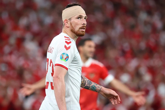 epa09291953 Pierre-Emile Hojbjerg of Denmark reacts during the UEFA EURO 2020 group B preliminary round soccer match between Russia and Denmark in Copenhagen, Denmark, 21 June 2021. EPA/Wolfgang Ratta ...