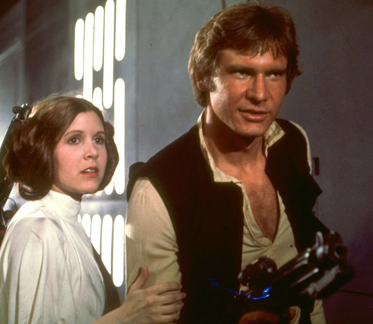 Mark Hamill, Carrie Fisher, and Harrison Ford (from left) appear in character in a scene from the 1977 film 'Star Wars'. Twenty years after its initial release, and two weeks after its reiss ...