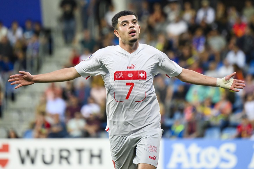 epa10695693 Switzerland&#039;s forward Zeki Amdouni celebrates his goal after scoring the 0-2 during the UEFA Euro 2024 qualifying soccer match between Andorra and Switzerland at the Estadi Nacional s ...