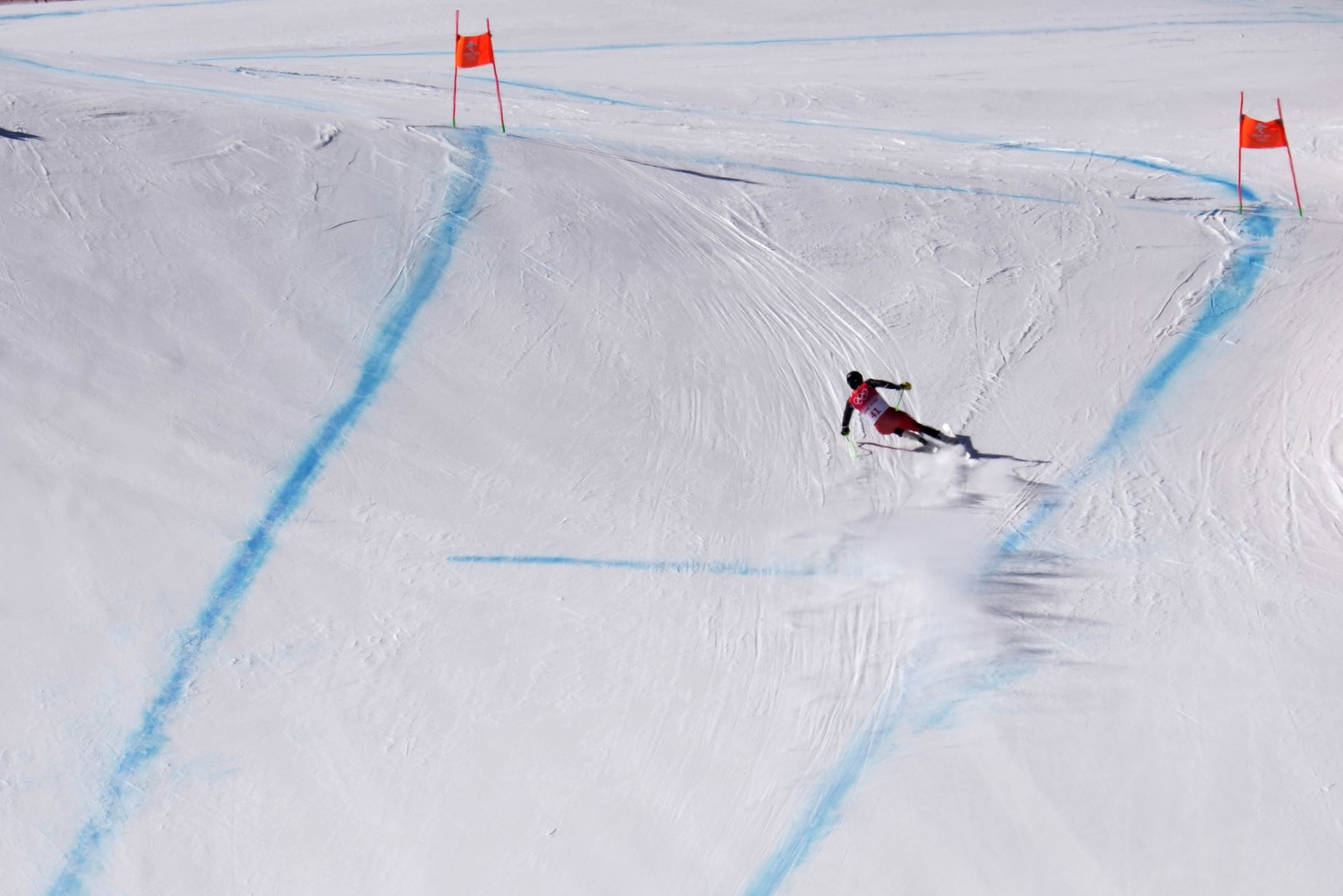 Broderick Thompson of Canada races down the course during a men&#039;s downhill training run at the 2022 Winter Olympics, Thursday, Feb. 3, 2022, in the Yanqing district of Beijing. (AP Photo/Luca Bru ...