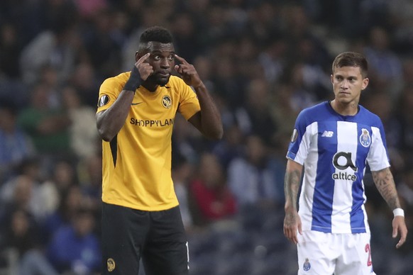 Young Boys&#039; Jean-Pierre Nsame, left, gestures after scoring his side&#039;s first goal from the penalty spot during the Europa League group G soccer match between FC Porto and Young Boys at the D ...