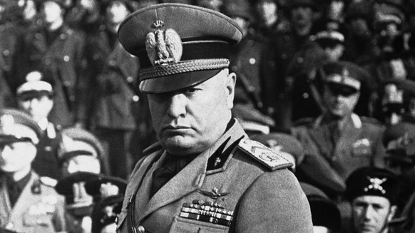 Italian Dictator Benito Mussolini when he attended the ceremony celebrating the 12 anniversary of the foundation of the Musketeers, his personal bodyguard in Rome on Feb. 17, 1943. (KEYSTONE/AP Photo)
