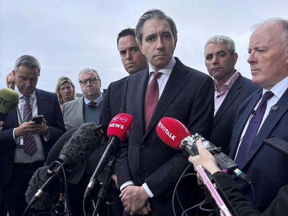 Taoiseach Simon Harris speaks to the press at the Curragh Racecourse, commenting on the striking of a military camp in southern Lebanon, where Irish peacekeeping troops are based, which has been struc ...