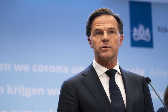 epa08870909 Dutch Prime Minister Mark Rutrte speaks at a press conference in The Hague, The Netherlands, 08 December 2020 There may be stricter measures before Christmas if the coronavirus related fig ...