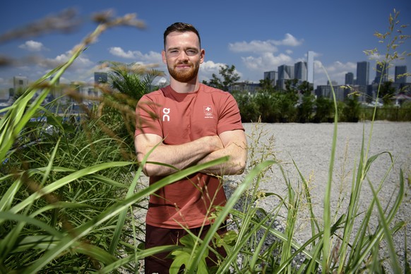 epa09357383 Swiss artistic gymnast Benjamin Gischard poses for photographers after a virtual press conference at the 2020 Summer Olympics, in Tokyo, Japan, 22 July 2021. EPA/LAURENT GILLIERON EDITORIA ...