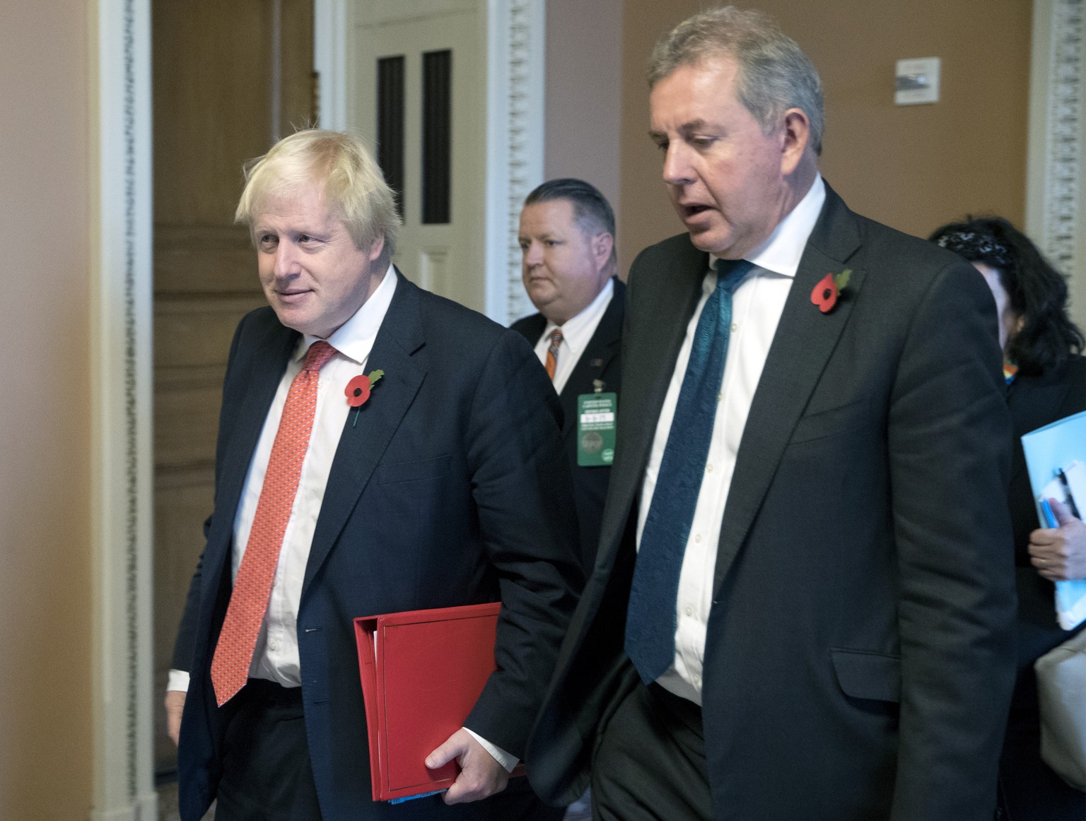 epa07704643 (FILE) - British Foreign Secretary Boris Johnson (L) walks with British Ambassador to the United States Sir Kim Darroch (R) following a meeting on Capitol Hill in Washington, DC, USA, 08 N ...