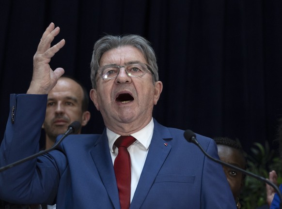 epa11465751 Jean-Luc Melenchon leader of La France Insoumise (LFI) reacts after the announcement of the results of the second round of the legislative elections in Paris, France, 07 July 2024. France  ...