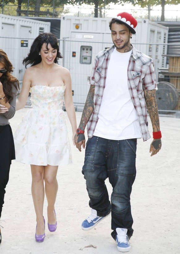 Celebs at Christian Dior Fashion Show - Paris Katy Perry and her boyfriend Travis McCoy attending the Christian Dior Spring-Summer 2009 Ready-to-Wear collection show held at Jardin des Tuileries in Pa ...