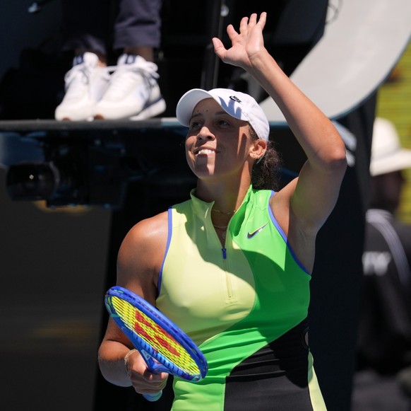 Madison Keys of the U.S. waves after defeating Karolina Pliskova of the Czech Republic in their third round match at the Australian Open tennis championship in Melbourne, Australia, Saturday, Jan. 24, ...