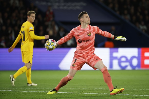 epa11271050 Barcelona goalkeeper Marc-Andre ter Stegen (R) in action during the UEFA Champions League quarter-finals, 1st leg soccer match between Paris Saint-Germain and FC Barcelona, in Paris, Franc ...