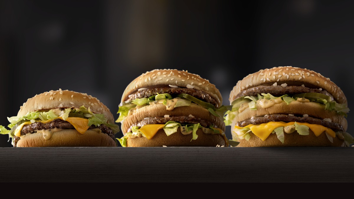 This photo provided by McDonald's shows, from left to right: McDonald's Mac Jr., Big Mac and Grand Mac. McDonald's is testing bigger and smaller versions of its Big Mac as the world ...