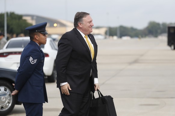 Secretary of State Mike Pompeo heads to his plane to depart for meetings with Saudi Arabia&#039;s King Salman in Saudi Arabia, Monday, Oct. 15, 2018 at Andrews Air Force Base, Md. (Leah Millis/Pool Im ...