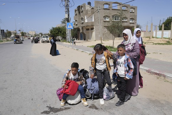 Displaced Palestinians, who flee from Rafah, arrive in Khan Younis, Gaza, on Monday, March 31, 2025, after the Israeli military issued sweeping evacuation orders covering most of Rafah. (AP Photo/Abde ...