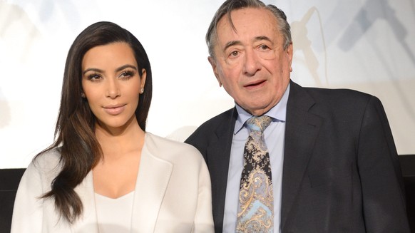 epa04102347 US television personality Kim Kardashian (L) and Austrian entrepreneur Richard Lugner pose at a press conference in Lugners &#039;Lugner City&#039; in Vienna, Austria, 27 February 2014. Ka ...